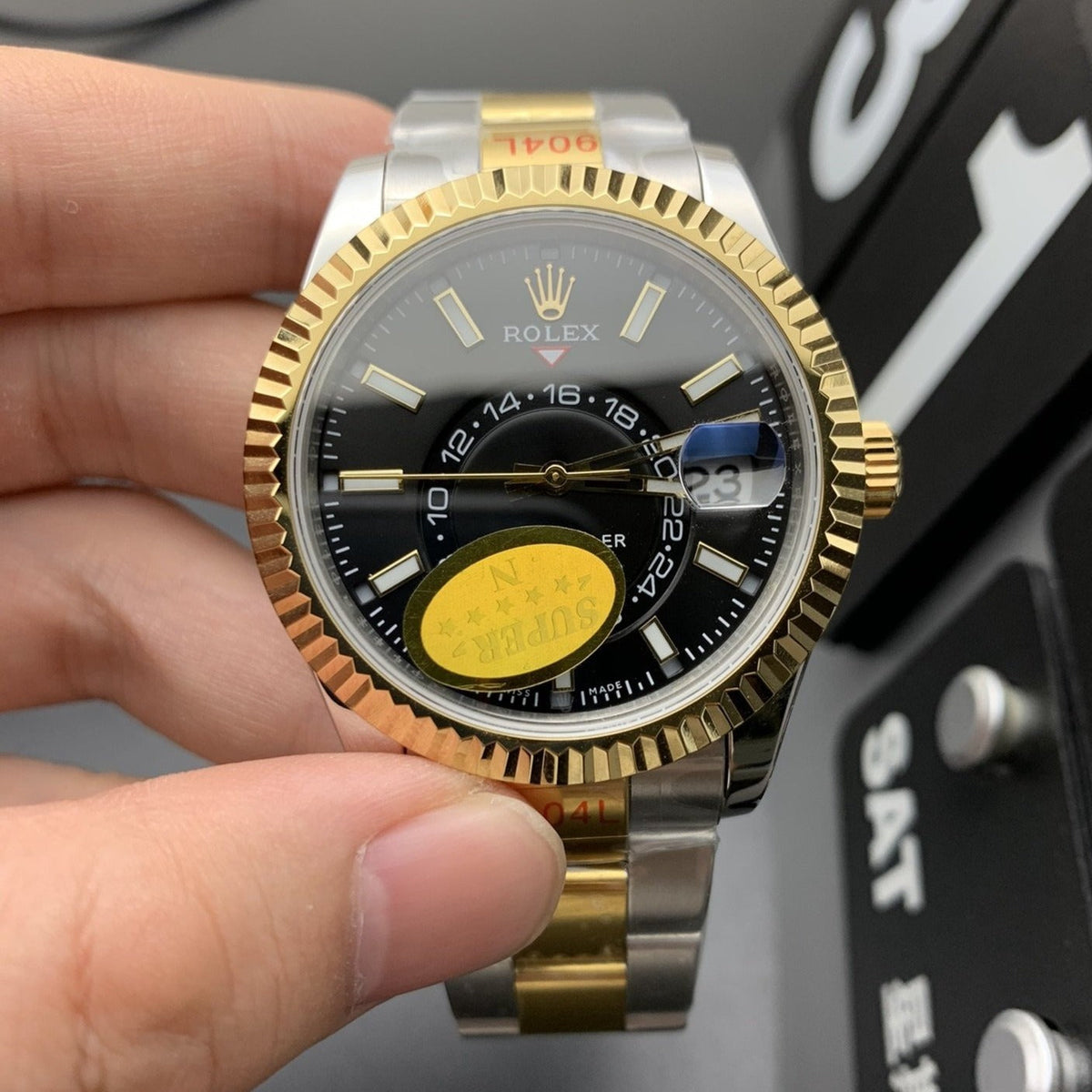 SKY DWELLER GOLD STEEL BLACK DIAL