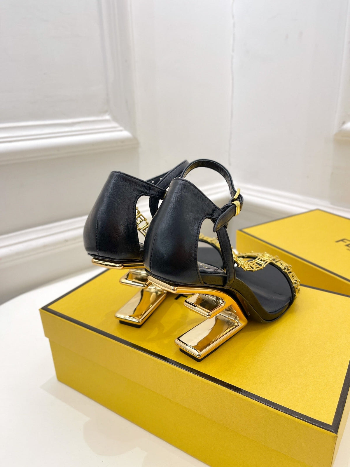FENDI HIGH-HEELED 85 MM SANDALS IN BLACK LAMBSKIN WITH GOLD HARDWARE