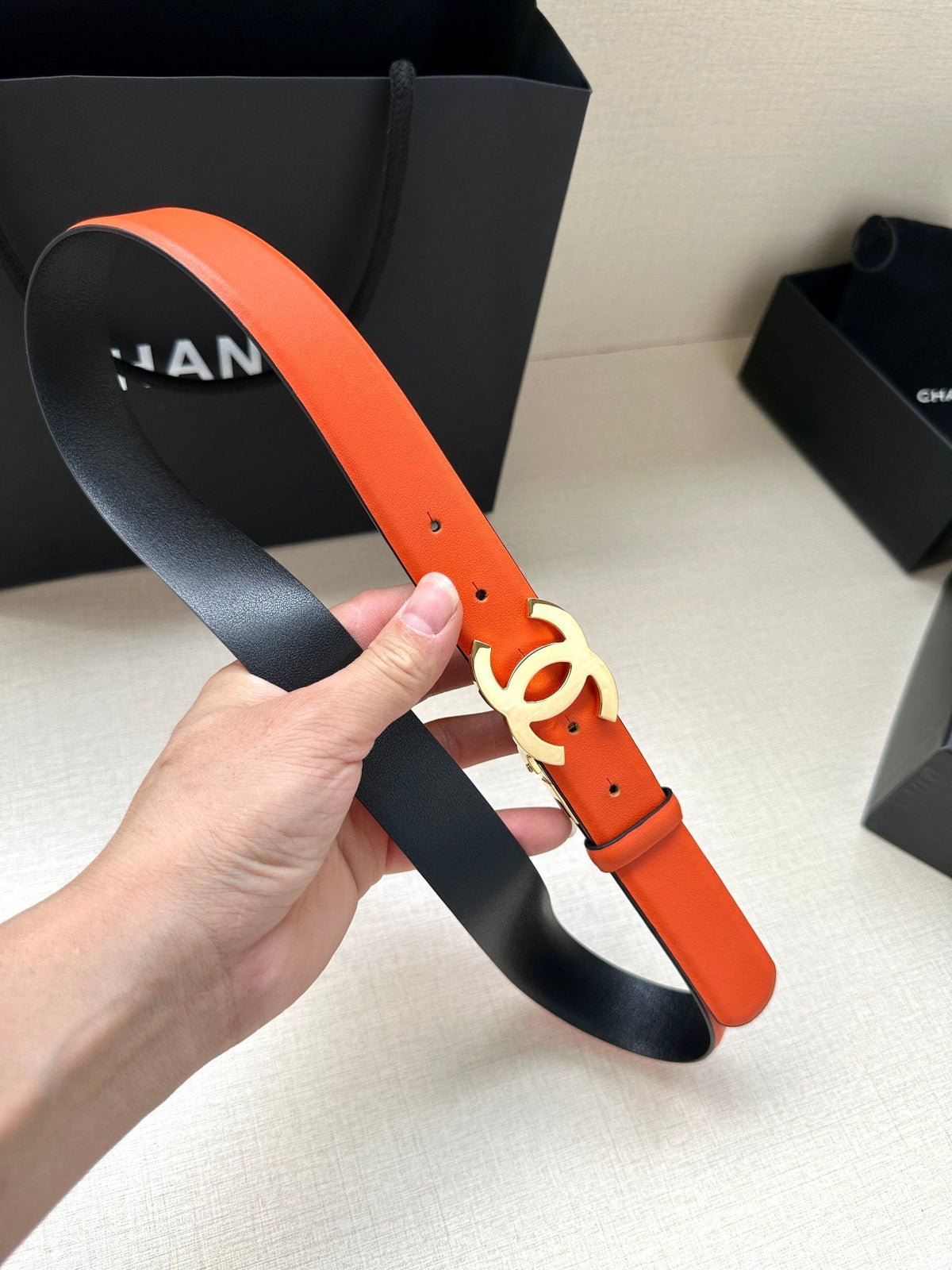 CC 30MM BELT IN FIRE ORANGE AND BLACK CALFSKIN WITH GOLD HARDWARE