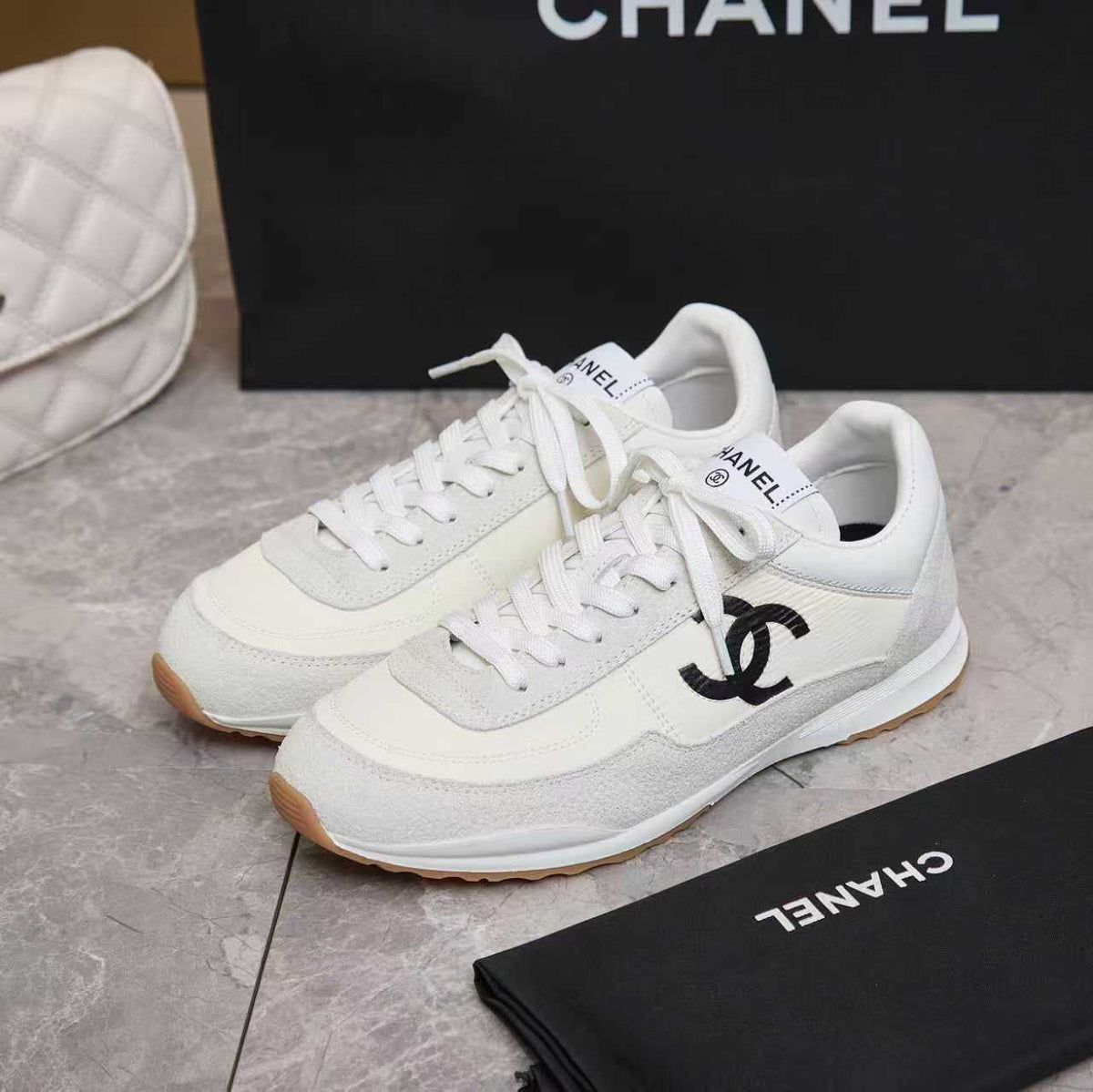 Chanel 2026 Sneaker White Black Fabric And Embossed Suede Calfskin