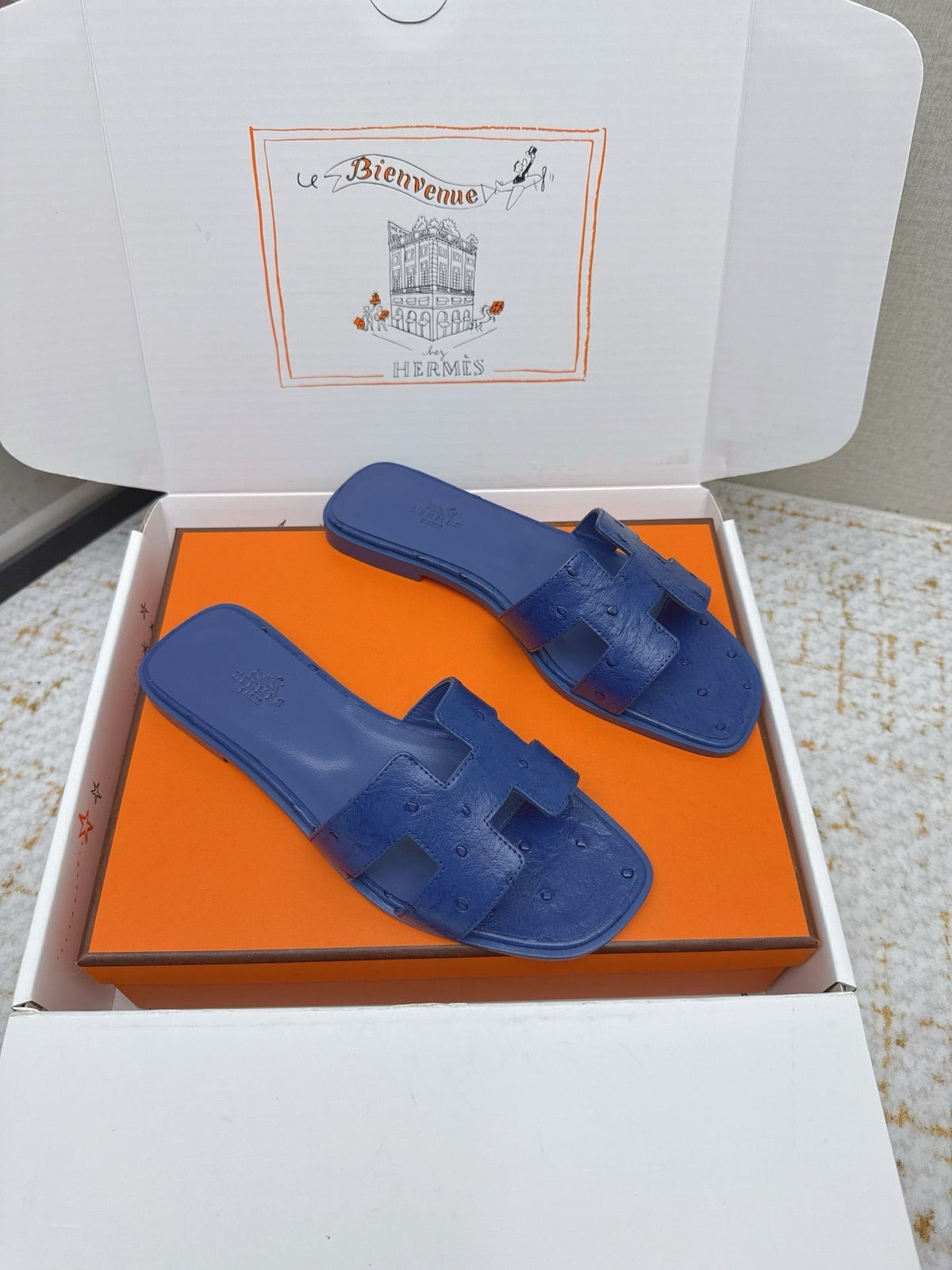 HM 26ss Oran Sandals Blue Encre Ostrich Leather 625091