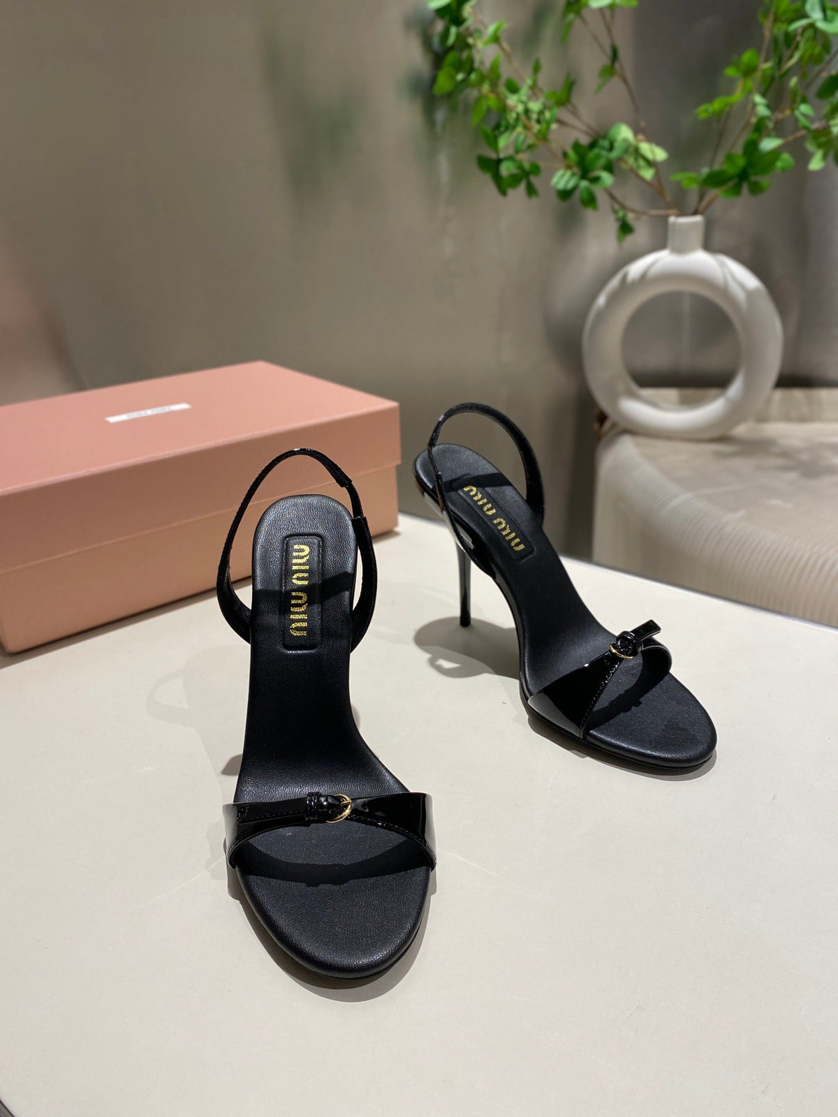TWO STRAP HIGH HEELED SANDALS IN BLACK GLOSSY SHEEPSKIN