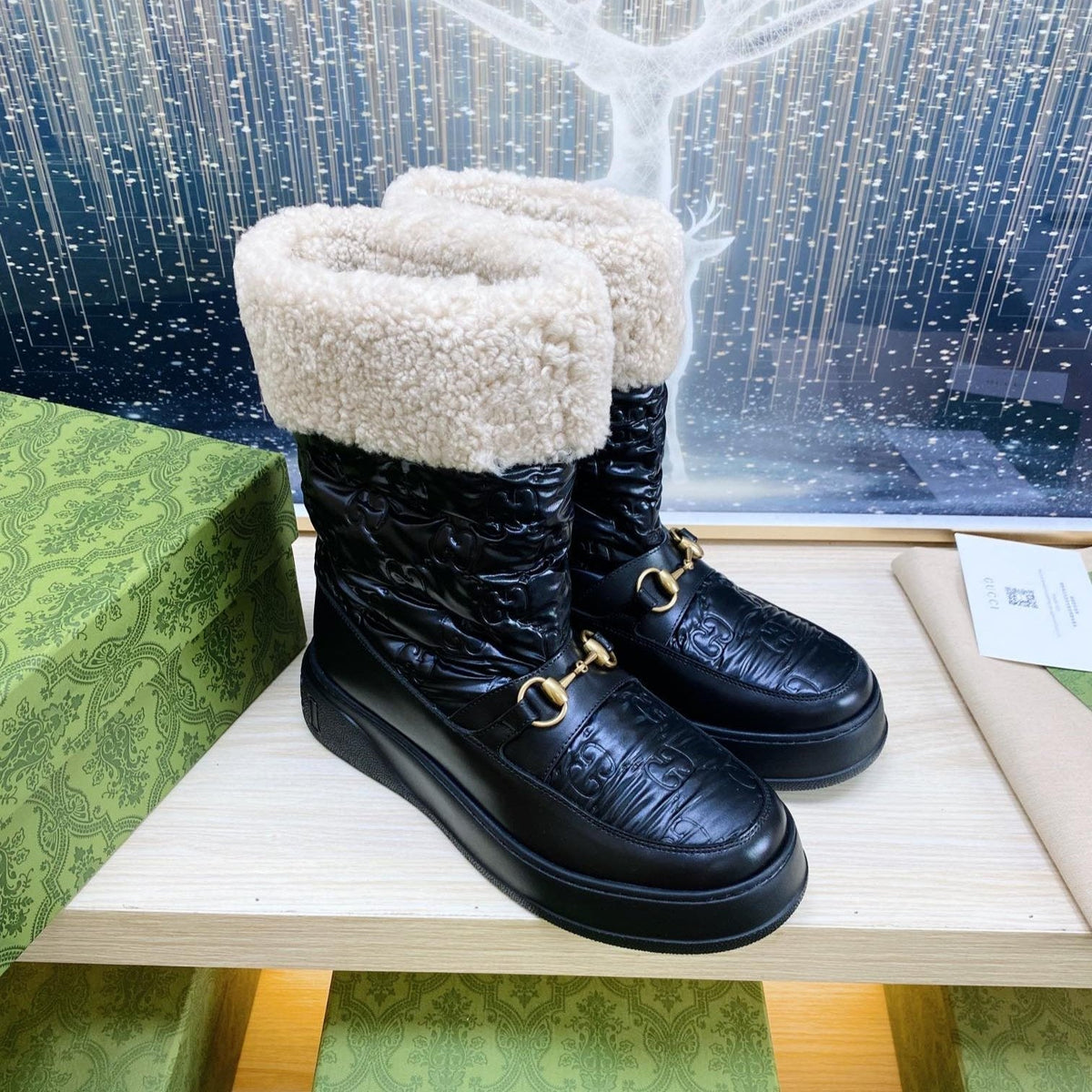 HORSEBIT ANKLE BOOTS WITH MERINO TRIM IN BLACK EMBOSSED CALFSKIN