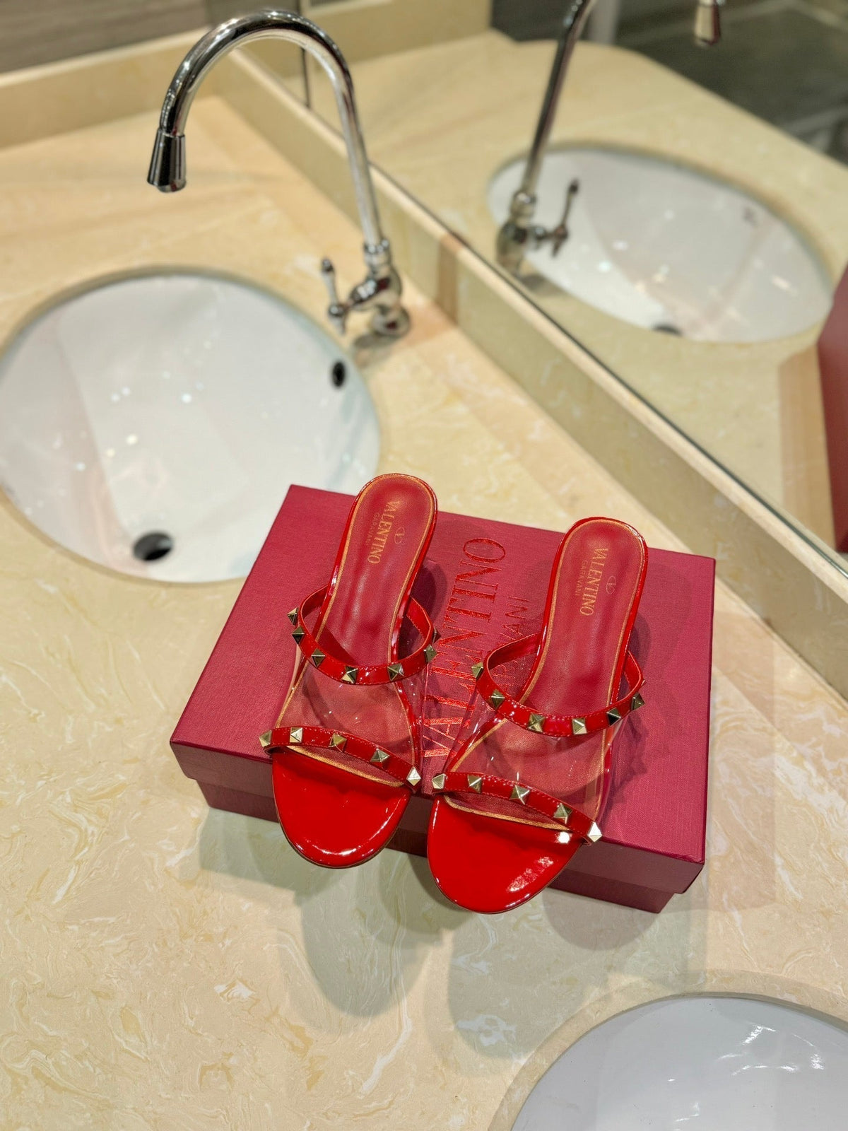 ROCKSTUD MULE SANDALS IN CHERRY RED CALFSKIN AND TRANSPARENT PVC FILM