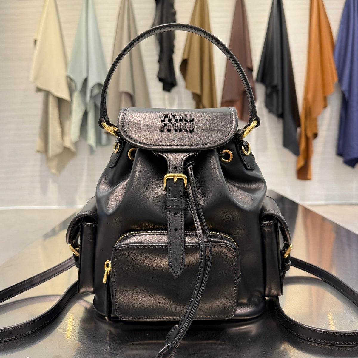 MiuMiu 2026 Buckle Gold Backpack Leather