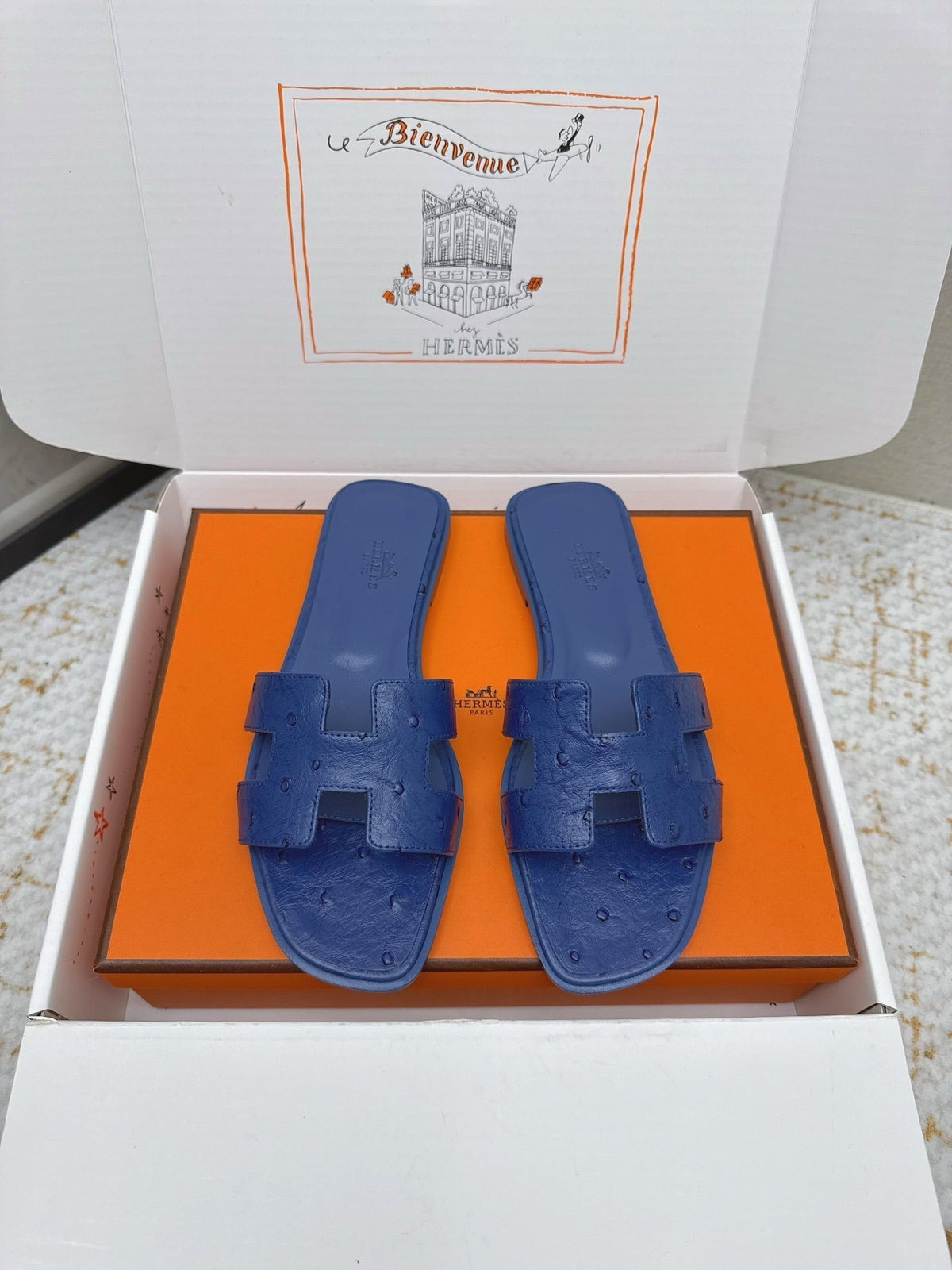 HM 26ss Oran Sandals Blue Encre Ostrich Leather 625091
