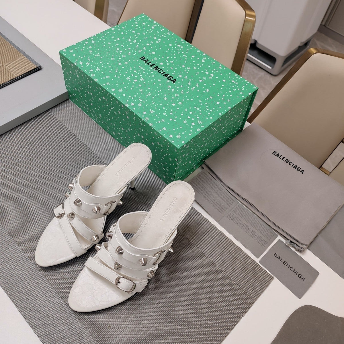 STRAPPY HIGH-HEELED SANDALS IN WHITE STUDDED WAX-OIL SHEEPSKIN