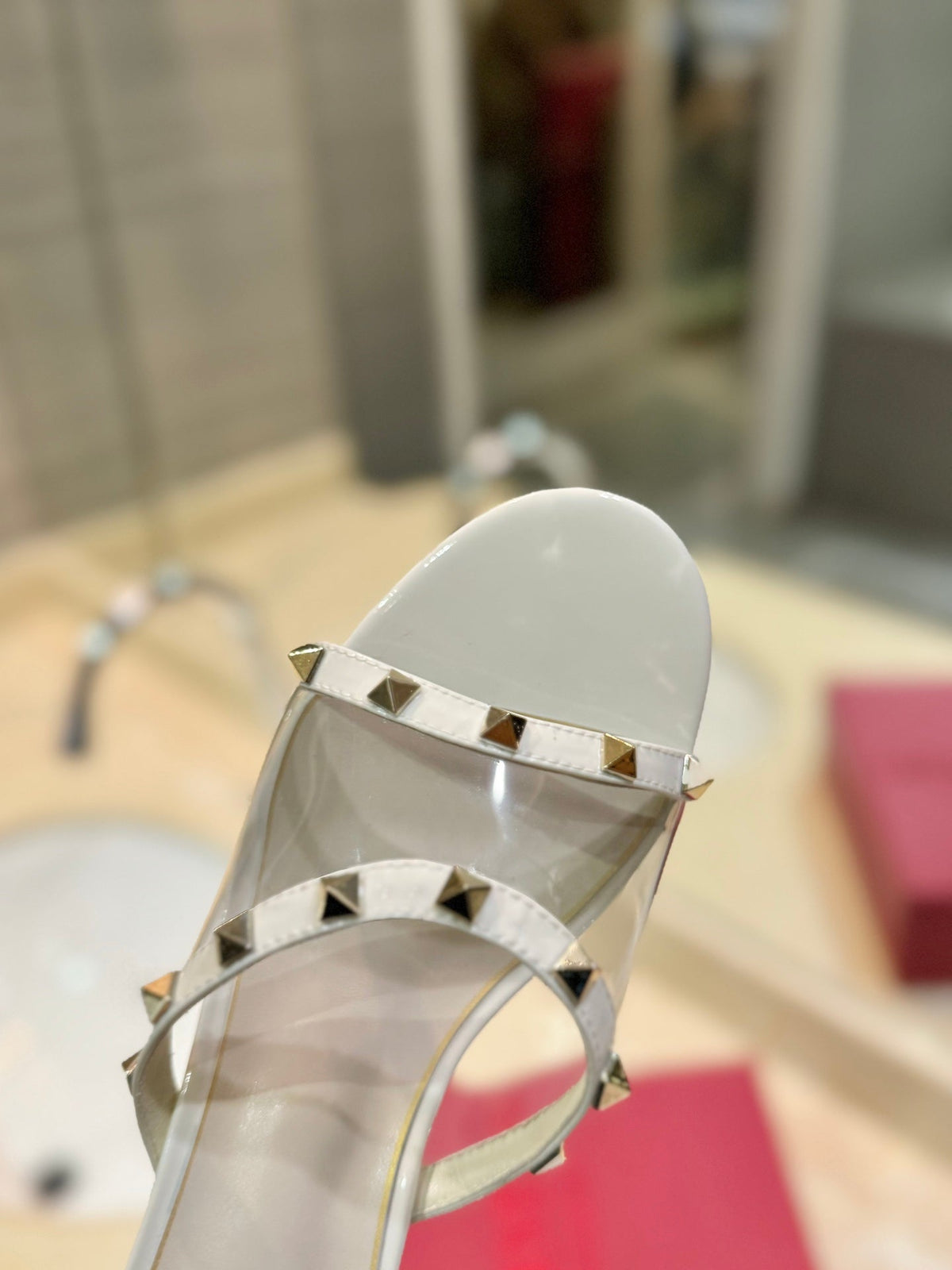 ROCKSTUD MULE SANDALS IN WHITE CALFSKIN AND TRANSPARENT PVC FILM