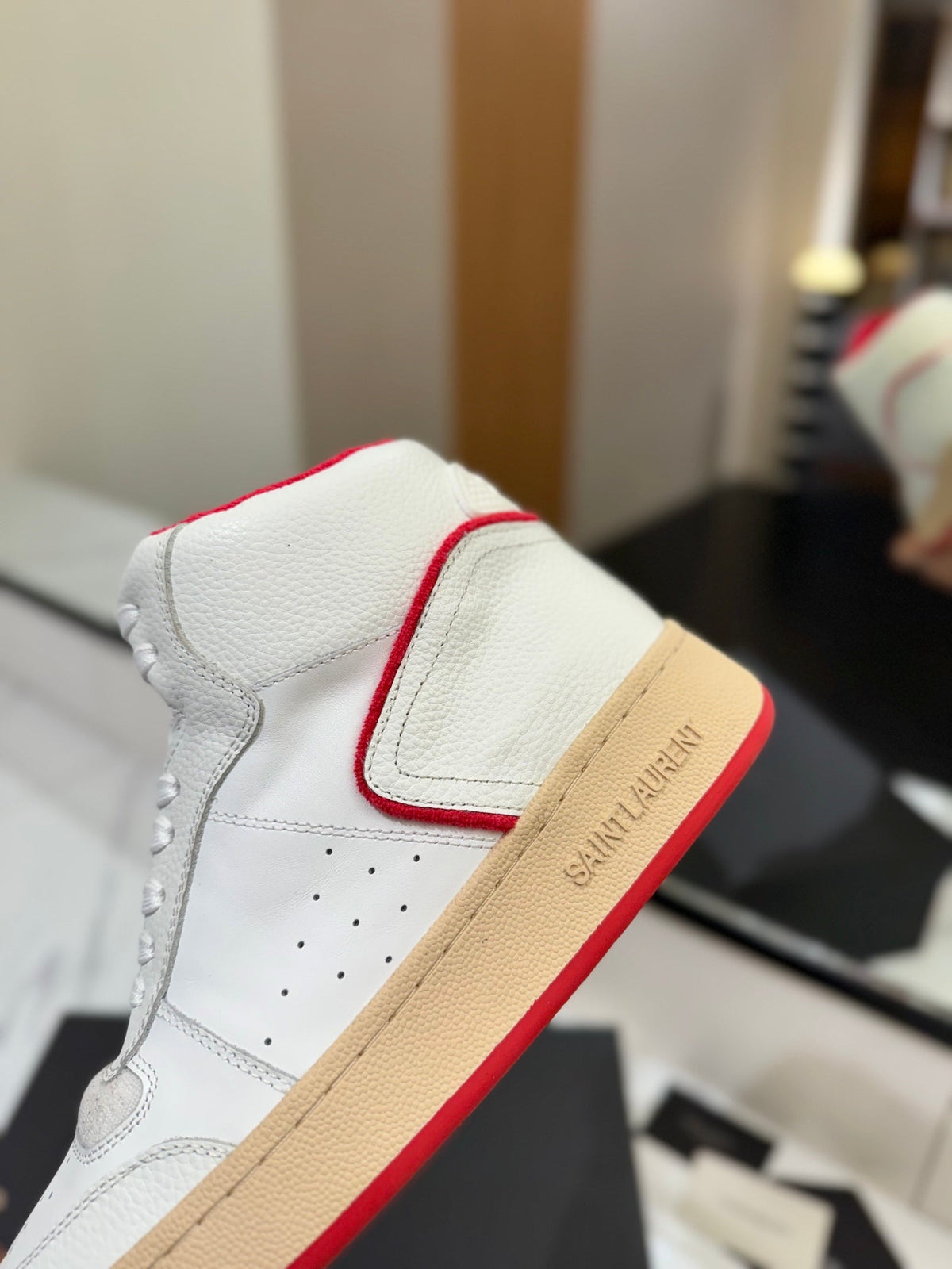 MID-TOP SNEAKERS IN WHITE AND RED TRIM PERFORATED LAMBSKIN