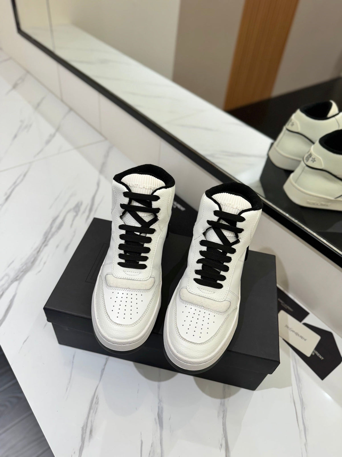 MID-TOP SNEAKERS IN WHITE AND BLACK TRIM PERFORATED LAMBSKIN