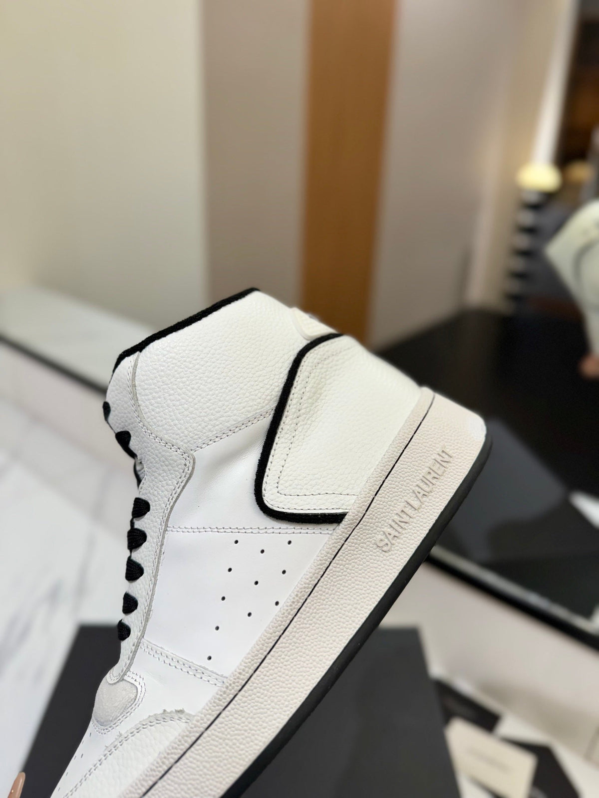 MID-TOP SNEAKERS IN WHITE AND BLACK TRIM PERFORATED LAMBSKIN